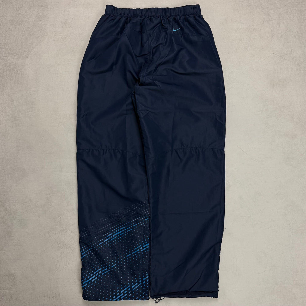 Conjunto Nike Tn7 "Paneled" 00' Masculino
